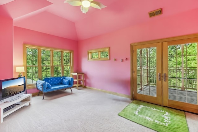 sitting room with visible vents, carpet floors, french doors, and a healthy amount of sunlight