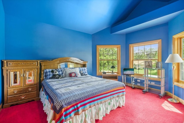 carpeted bedroom featuring baseboards and vaulted ceiling