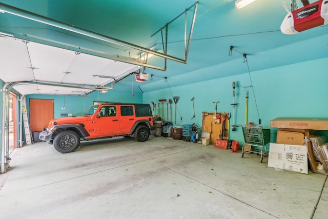 garage featuring a garage door opener
