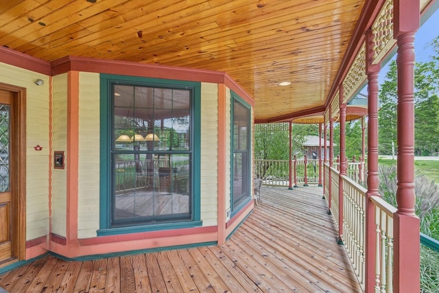 wooden terrace featuring a porch
