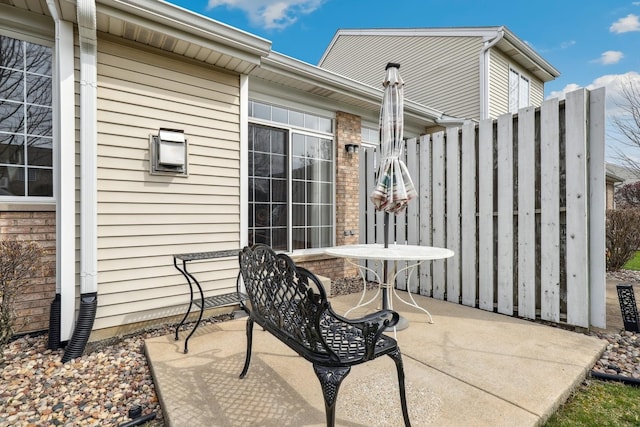 view of patio with fence