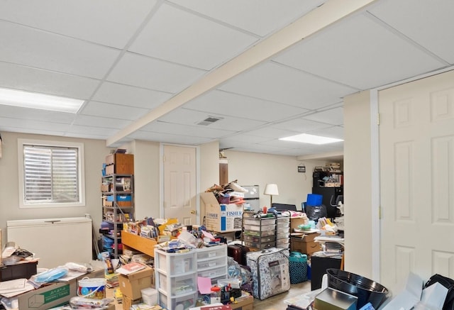 below grade area featuring a drop ceiling