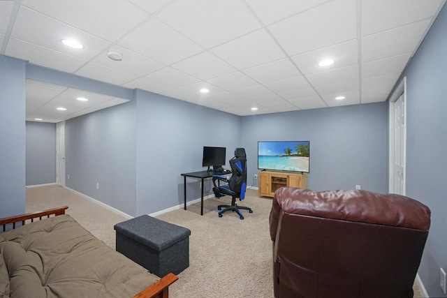 carpeted office space with a paneled ceiling, baseboards, and recessed lighting