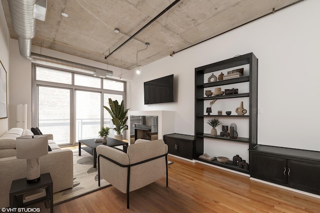 933 W Van Buren St Unit 523, Chicago, IL 60607 - interior space featuring visible vents, baseboards, and wood finished floors