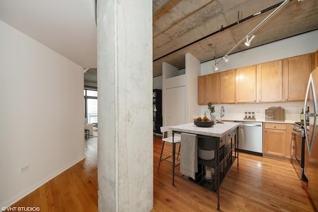 933 W Van Buren St Unit 523, Chicago, IL 60607 - unfurnished living room featuring a fireplace and light wood-type flooring