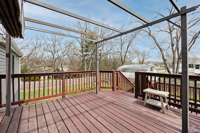 wooden deck featuring fence