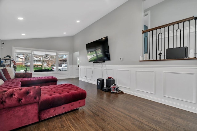 living area featuring lofted ceiling, wainscoting, wood finished floors, and recessed lighting