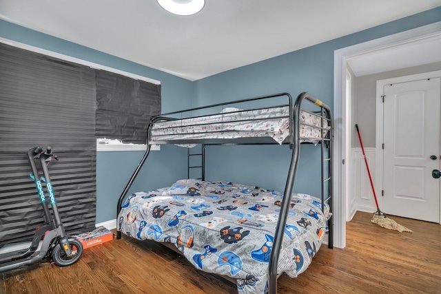 bedroom with wood finished floors