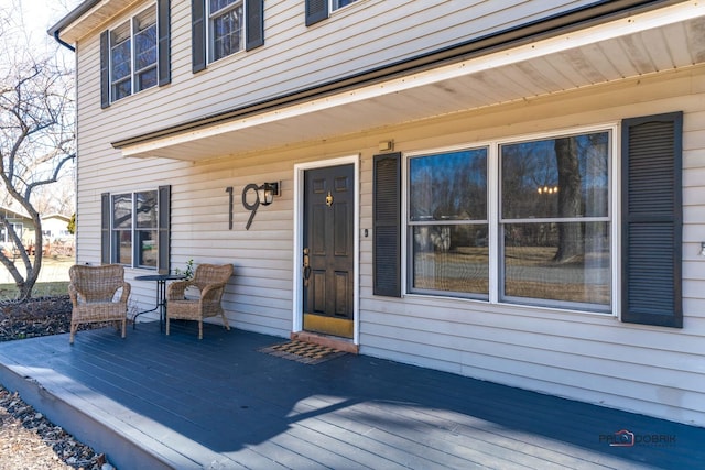 doorway to property featuring a deck