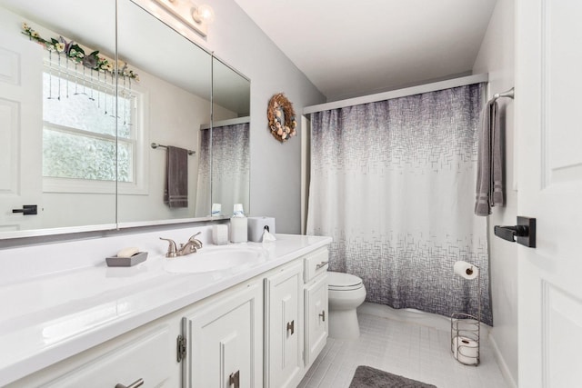 full bath featuring tile patterned floors, curtained shower, vanity, and toilet