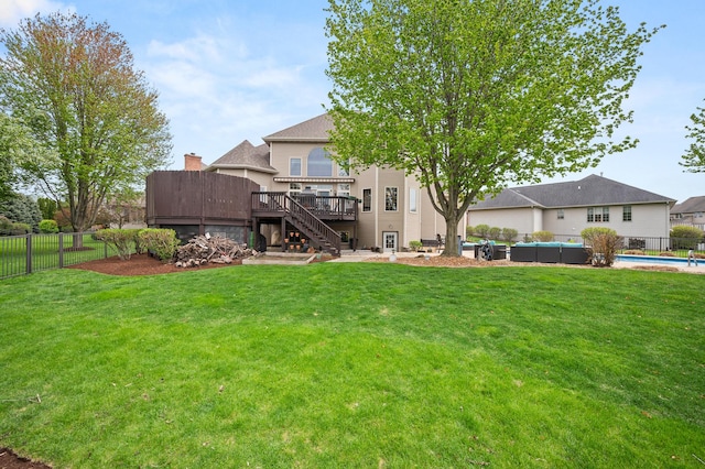 view of yard with a fenced backyard, stairway, a wooden deck, a fenced in pool, and outdoor lounge area