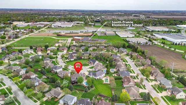 aerial view with a water view and a residential view