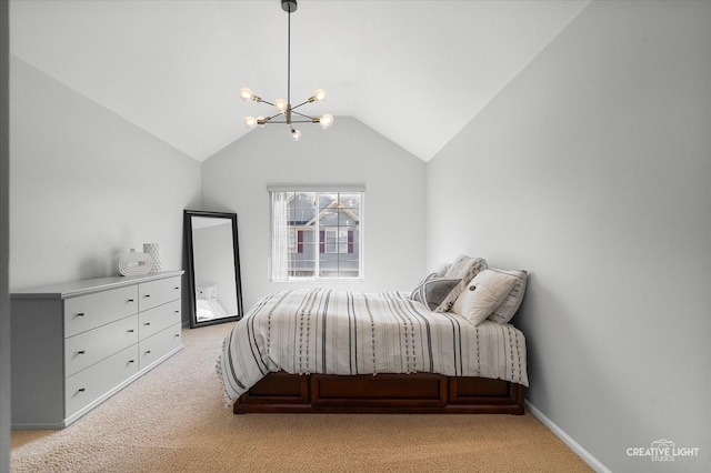 bedroom with carpet floors, a chandelier, vaulted ceiling, and baseboards