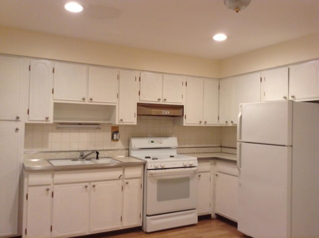 960 Shermer Rd Unit 2, Glenview, IL 60025 - kitchen featuring white appliances, a sink, white cabinets, decorative backsplash, and recessed lighting
