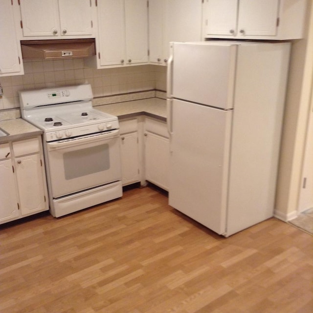 960 Shermer Rd Unit 2, Glenview, IL 60025 - kitchen with white appliances, light wood-type flooring, light countertops, white cabinets, and under cabinet range hood
