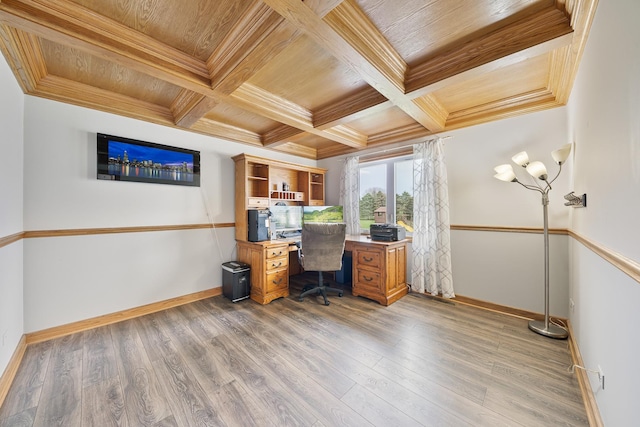 office space featuring crown molding, light wood-style flooring, wood ceiling, coffered ceiling, and baseboards