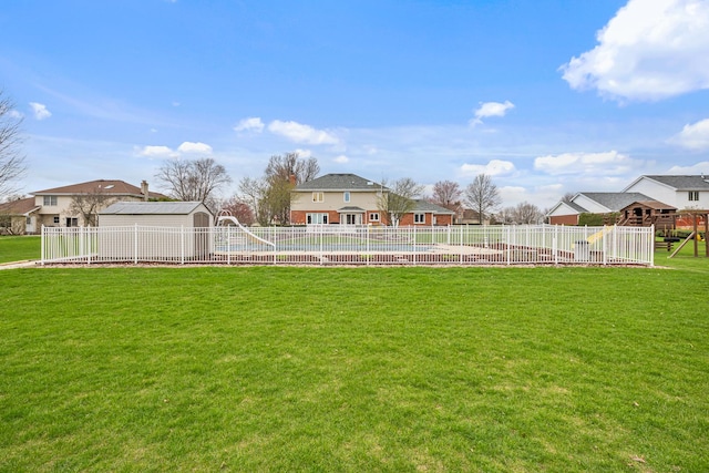 view of yard with fence