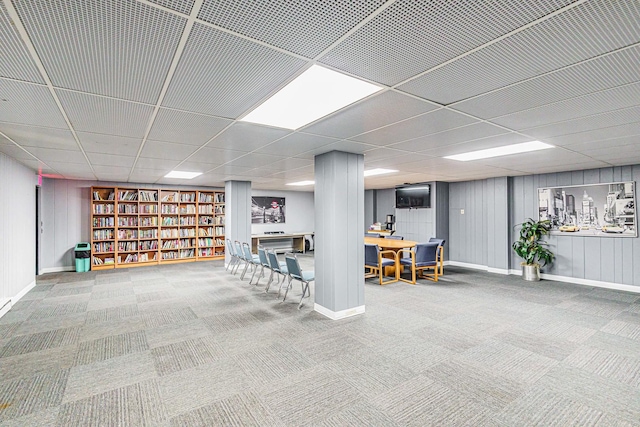 465 W Dominion Dr Unit 1302, Wood Dale, IL 60191 - finished basement featuring a paneled ceiling, carpet floors, and baseboards