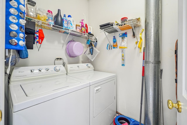 laundry room with laundry area and separate washer and dryer