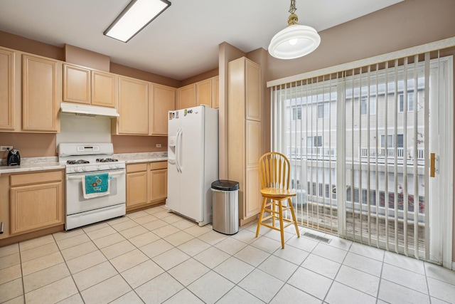 kitchen with visible vents, white appliances, light brown cabinets, and under cabinet range hood