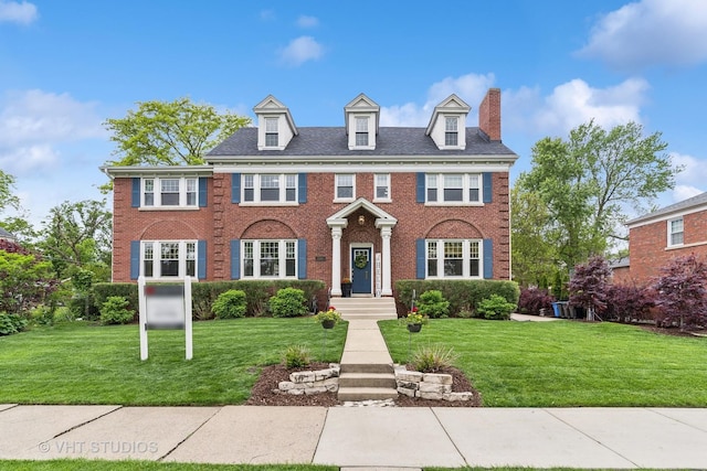 10044 S Leavitt St, Chicago, IL 60643 - colonial-style house featuring brick siding, a chimney, and a front lawn
