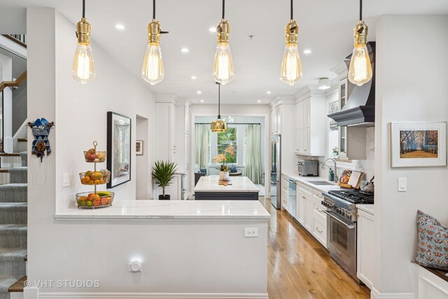 10044 S Leavitt St, Chicago, IL 60643 - kitchen with high quality appliances, a sink, light wood-style flooring, white cabinetry, and recessed lighting