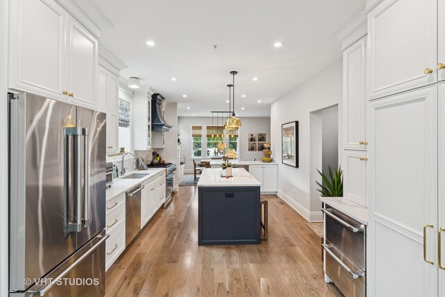 10044 S Leavitt St, Chicago, IL 60643 - kitchen with high quality appliances, a sink, white cabinets, recessed lighting, and light countertops