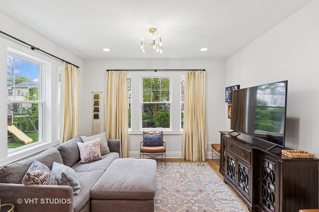 10044 S Leavitt St, Chicago, IL 60643 - living room with light wood finished floors, a chandelier, baseboards, and recessed lighting