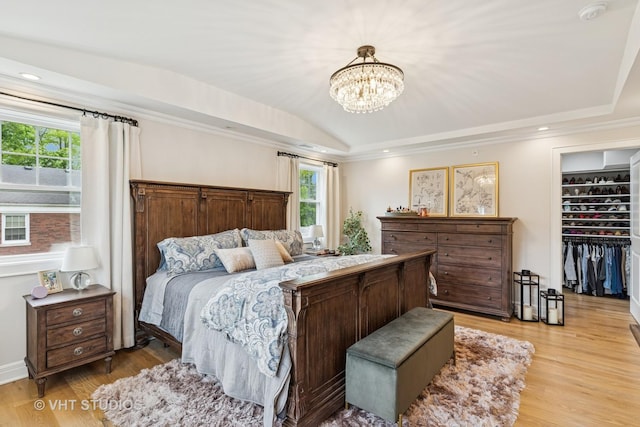10044 S Leavitt St, Chicago, IL 60643 - bedroom with multiple windows, light wood-style floors, a chandelier, lofted ceiling, and crown molding