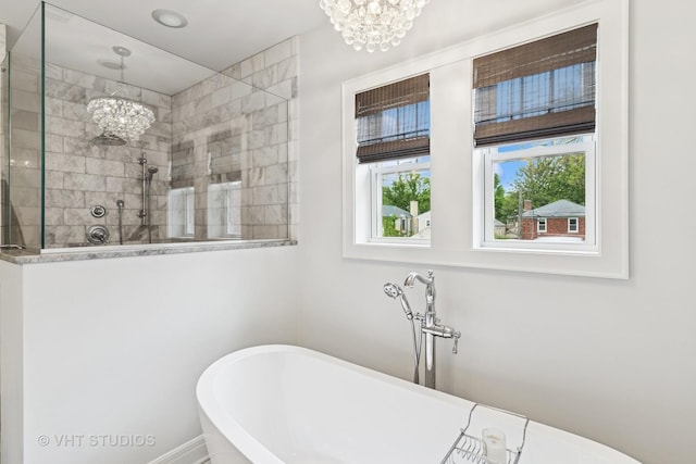 10044 S Leavitt St, Chicago, IL 60643 - bathroom with a chandelier, a walk in shower, and a freestanding bath
