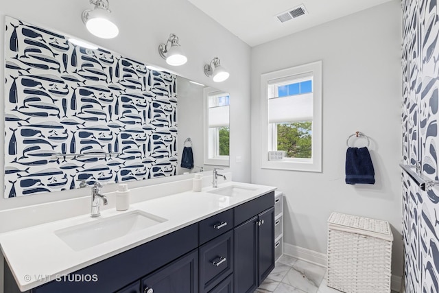 10044 S Leavitt St, Chicago, IL 60643 - bathroom featuring marble finish floors, double vanity, and baseboards