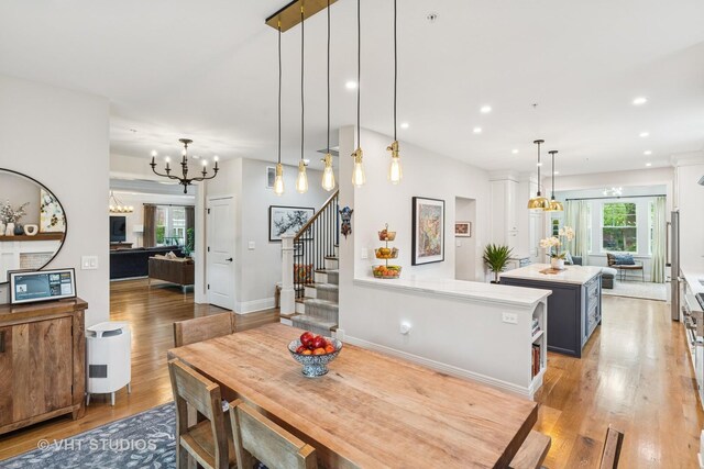 10044 S Leavitt St, Chicago, IL 60643 - dining space with a chandelier, stairs, light wood-style flooring, recessed lighting, and baseboards