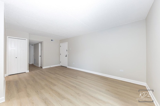 1221 Chalet Rd Unit 28-201, Naperville, IL 60563 - empty room with light wood-style flooring