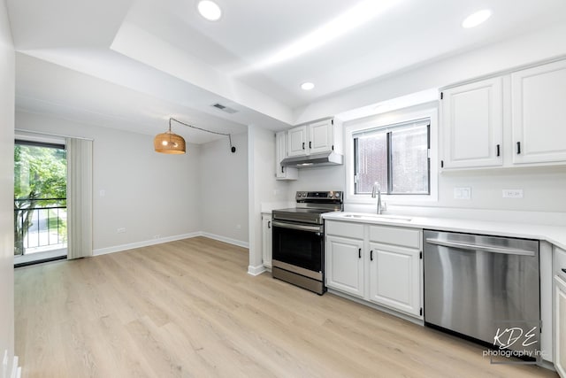 1221 Chalet Rd Unit 28-201, Naperville, IL 60563 - kitchen featuring appliances with stainless steel finishes, light wood-style floors, recessed lighting, white cabinets, and light countertops