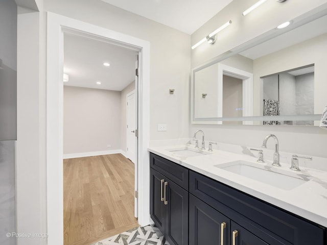 131 S Madison St, Hinsdale, IL 60521 - full bathroom with recessed lighting, double vanity, a sink, and wood finished floors