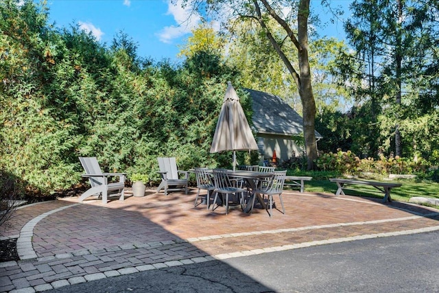 view of patio featuring outdoor dining space