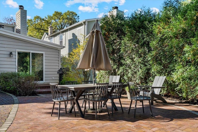 view of patio with outdoor dining area