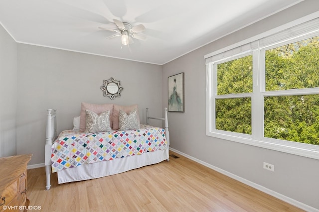 1900 Buckingham Rd, Mundelein, IL 60060 - bedroom with baseboards, wood finished floors, and ornamental molding
