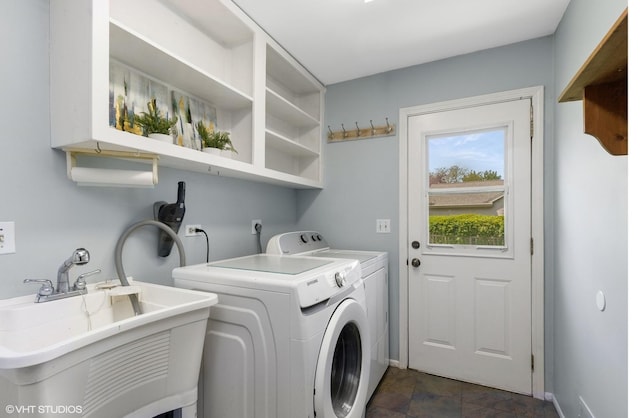 1900 Buckingham Rd, Mundelein, IL 60060 - laundry area featuring washer and dryer, baseboards, and dark stone finish floors