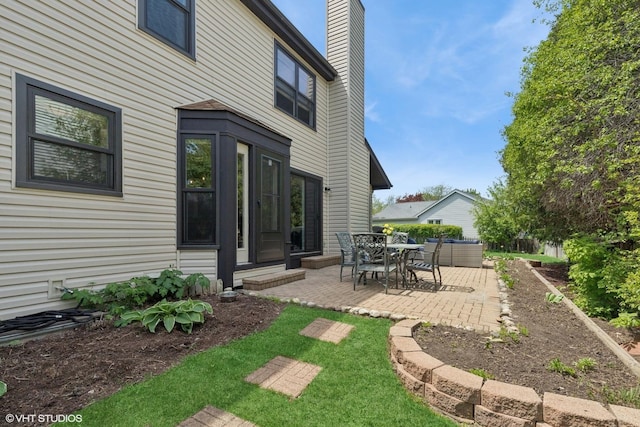 1900 Buckingham Rd, Mundelein, IL 60060 - rear view of property with a patio and a chimney