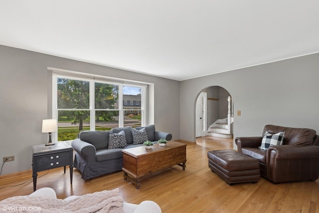 1900 Buckingham Rd, Mundelein, IL 60060 - living room featuring arched walkways and light wood finished floors
