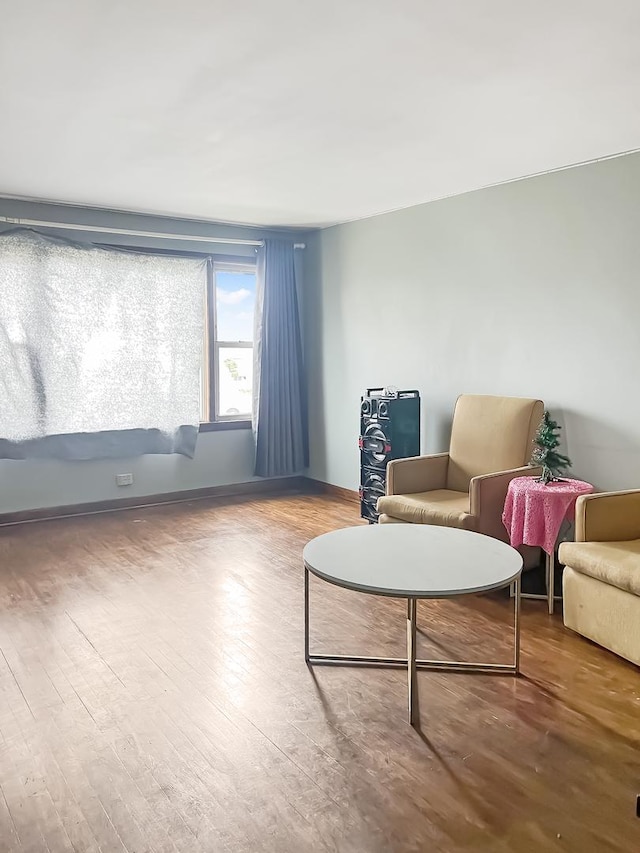 sitting room with wood finished floors