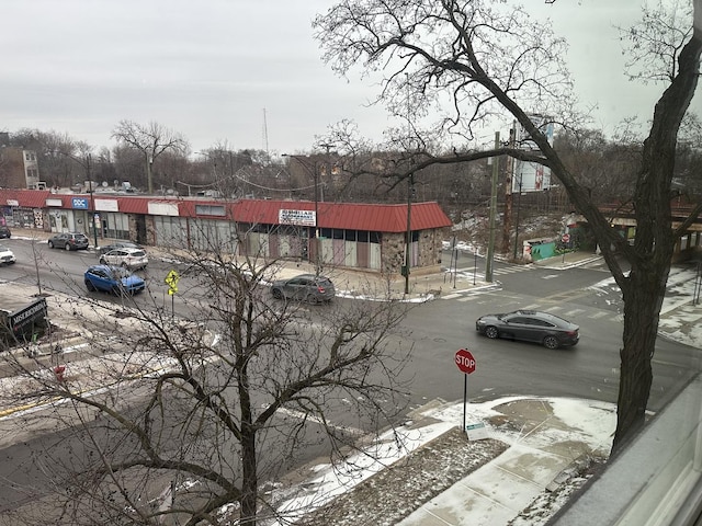 view of street with traffic signs and sidewalks