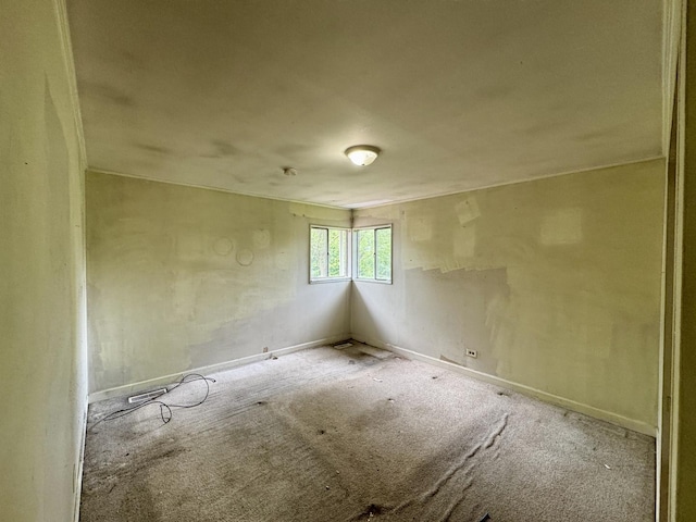 311 Seneca St, Park Forest, IL 60466 - spare room featuring carpet flooring and baseboards