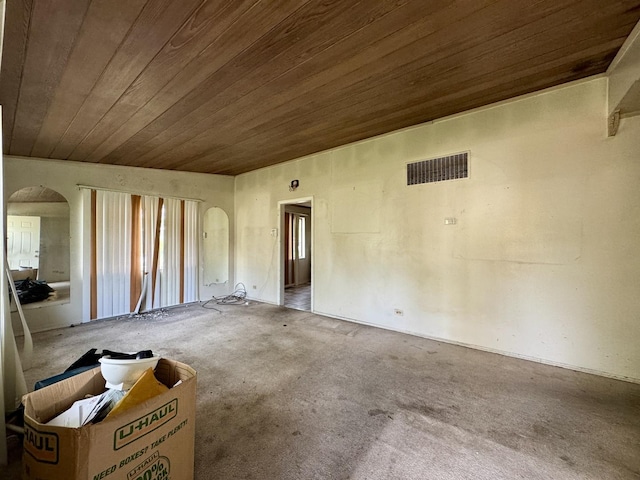 311 Seneca St, Park Forest, IL 60466 - carpeted spare room featuring arched walkways and wooden ceiling