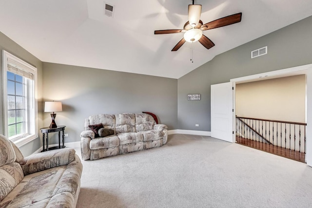 22814 Sara Springs Dr, Frankfort, IL 60423 - living area with baseboards, vaulted ceiling, carpet, and ceiling fan