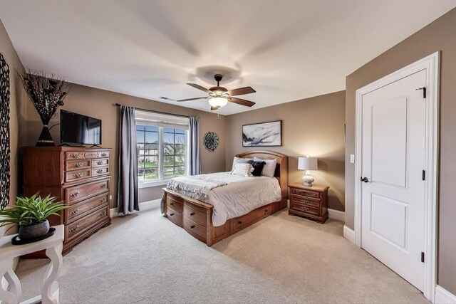 22814 Sara Springs Dr, Frankfort, IL 60423 - bedroom with baseboards, light colored carpet, and ceiling fan