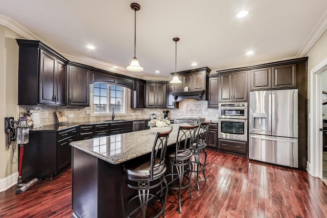 22814 Sara Springs Dr, Frankfort, IL 60423 - kitchen with stainless steel appliances, dark wood finished floors, a sink, stone countertops, and crown molding
