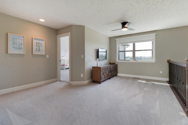 3605 Como Ct, Normal, IL 61761 - unfurnished bedroom with carpet flooring, baseboards, a textured ceiling, and ceiling fan