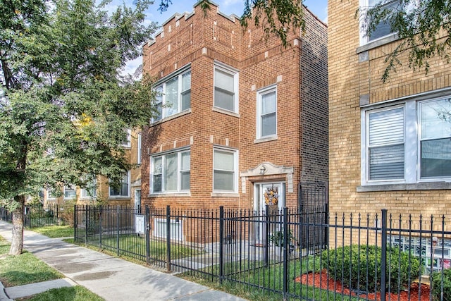 exterior space featuring a fenced front yard